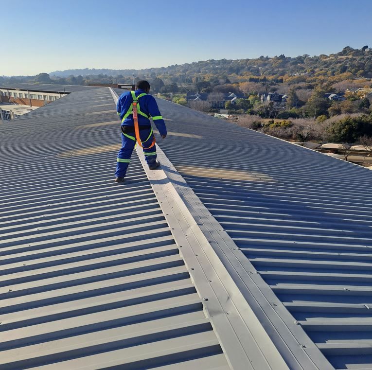 Roof repairs in Johannesburg at killarney chartwell court . roof completed by trusted painters
