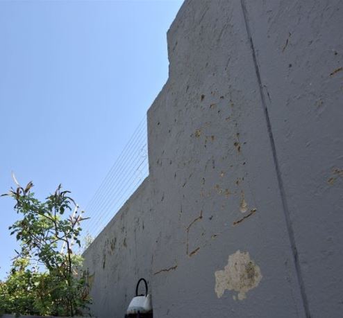 water-damaged wall